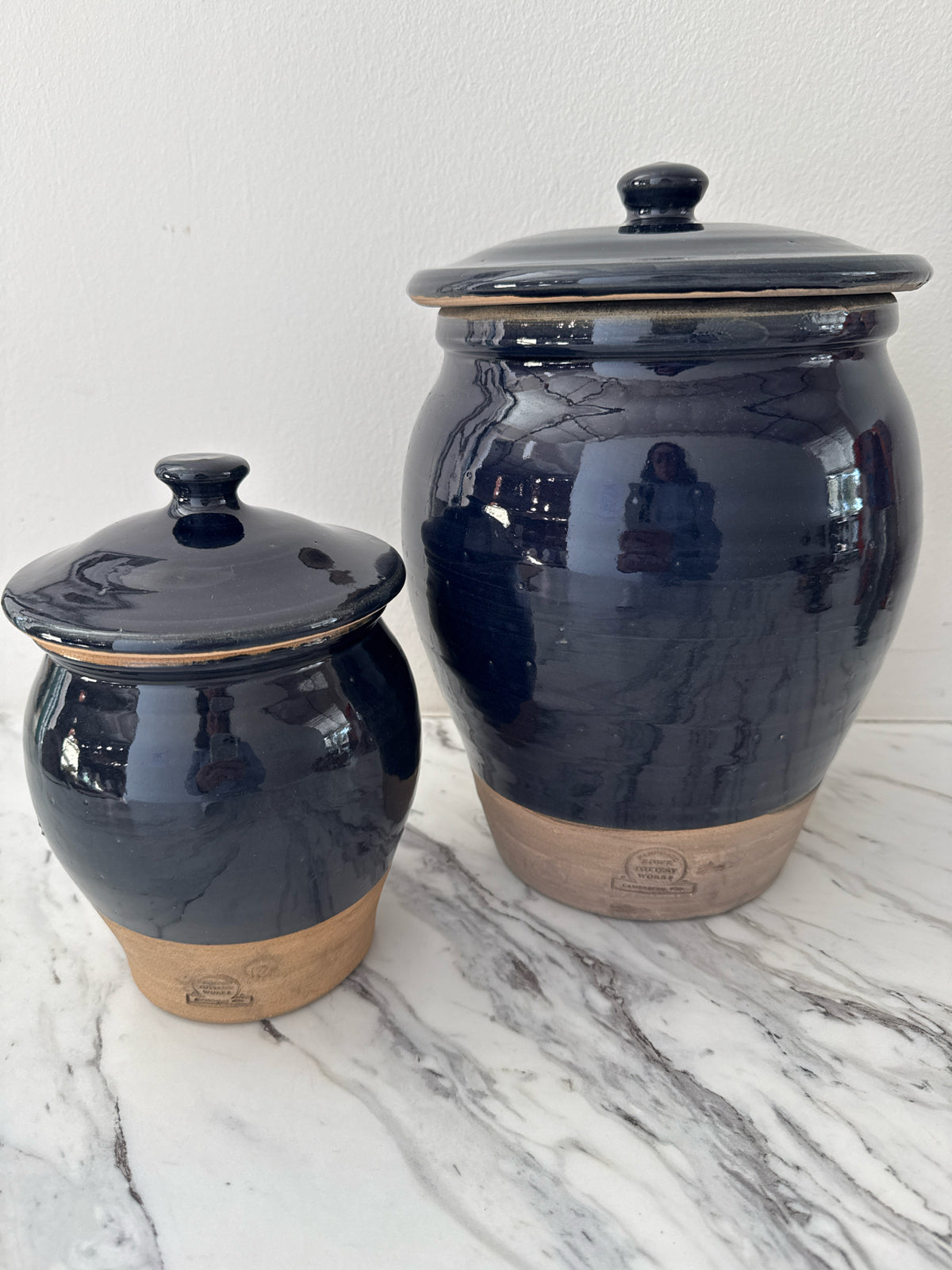 Pair of Rowe Pottery Navy Blue Glazed Terracotta Canisters with Lids