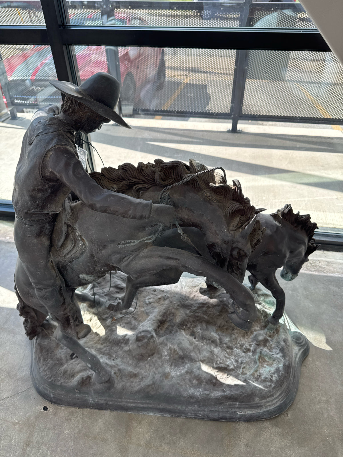 Monumental Frederic Remington Bronze Sculpture of Cowboy 42"w, 41"h (signed)
