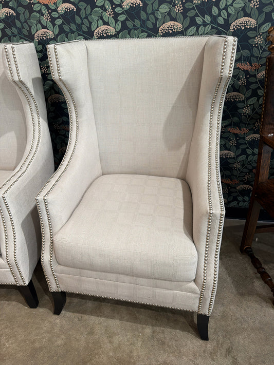 Cream Upholstered Silver Nailhead Trim Wingback Chair