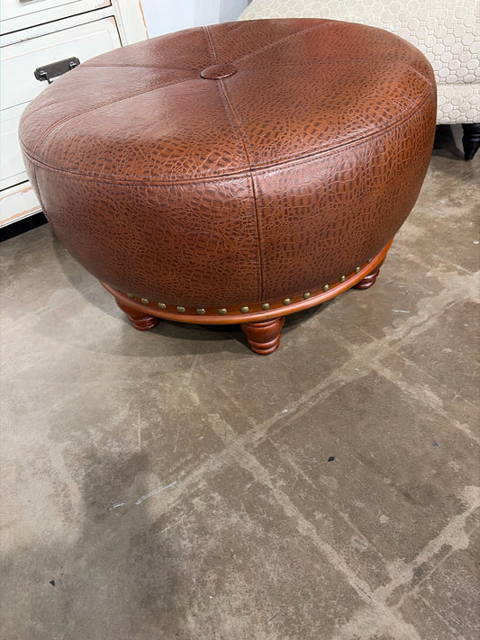 Round Faux Leather Ottoman With Nail Trim And Wood Feet 28" D