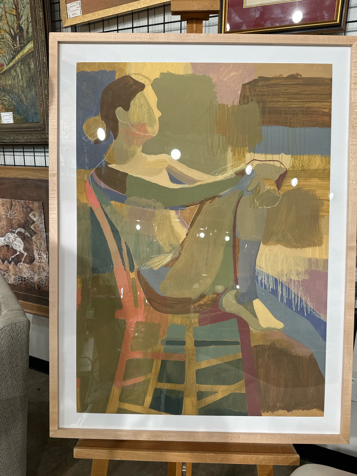 "Daydream Belview" by Katherine Bellisario- Woman Seated Blonde Frame 30 x 40