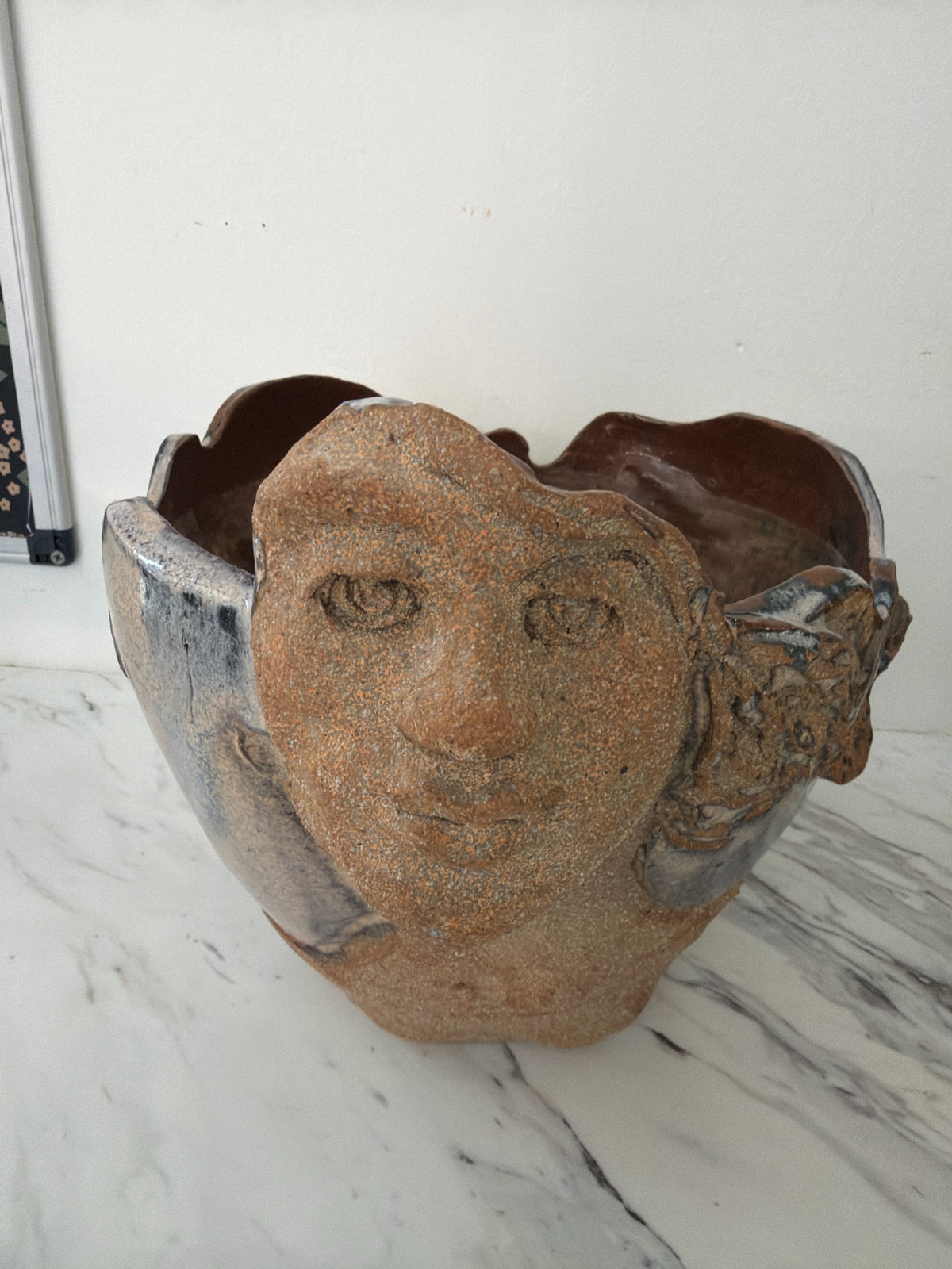 Signed T.M. Sculpted Human Face in Relief Pot