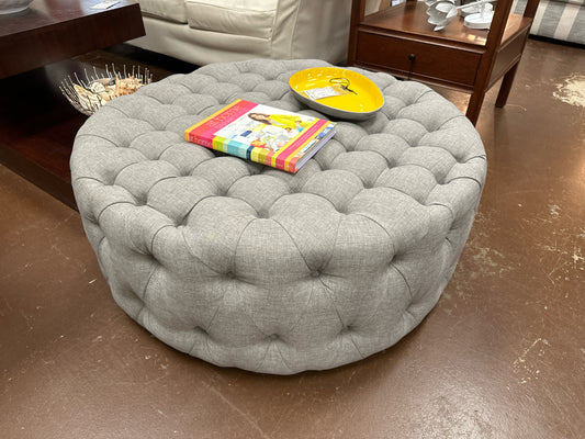 Round Grey Upholstered Ottoman