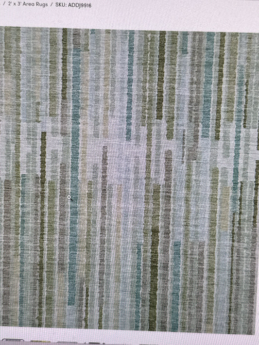 NEW Machine Washable Indoor/Outdoor Xhevrie Aloe Rug (10x14)